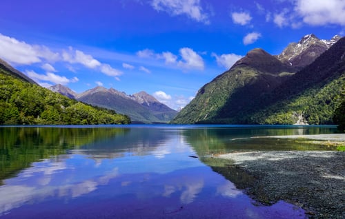 Clear blue sky on Mirror Lake, Milford Sound