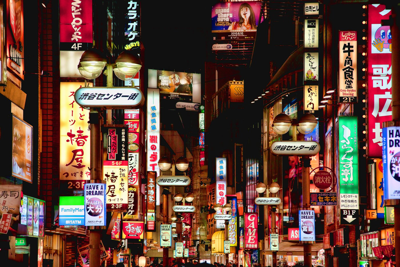 City lights in busy Shibuya district of Tokyo, Japan