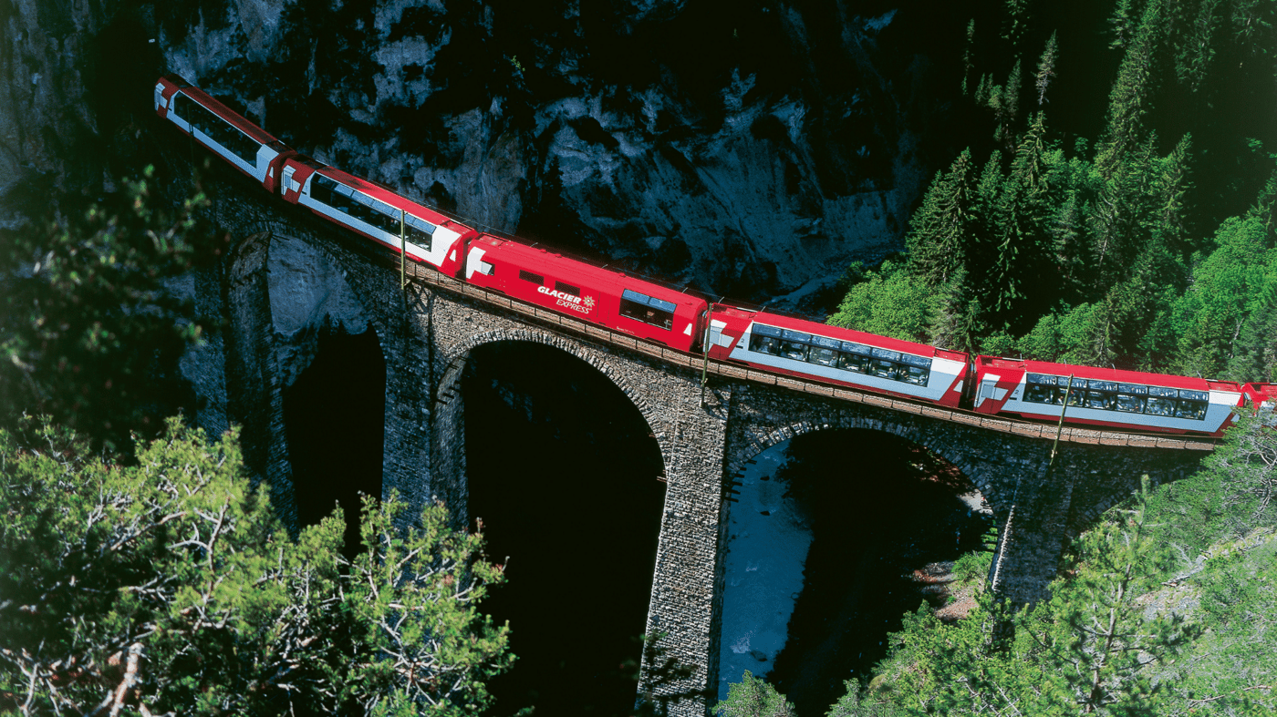 Traverse bridges and tunnels while aboard the world-renowned narrow gauge Glacier Express