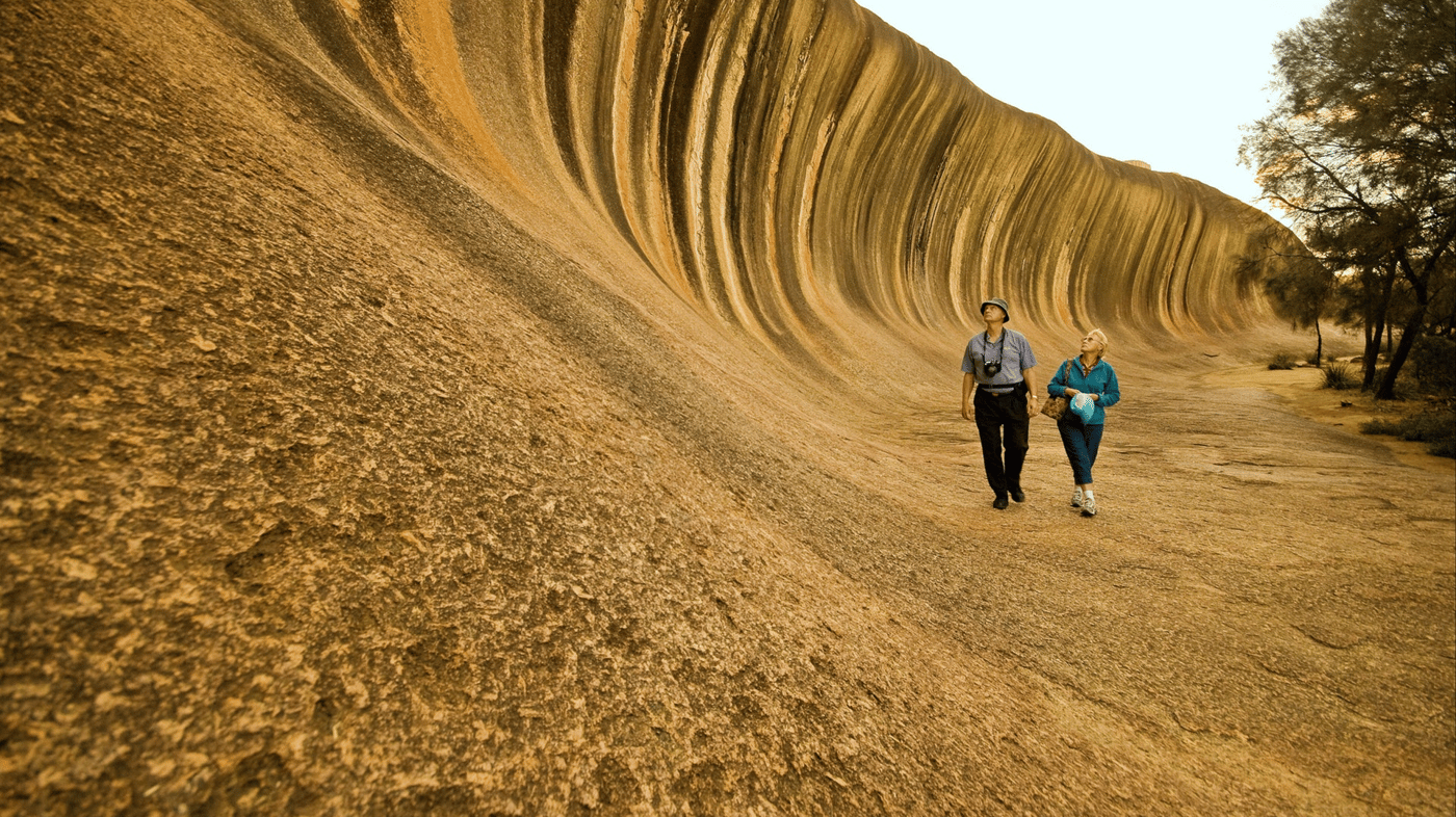 Explore the natural formation of Wave Rock