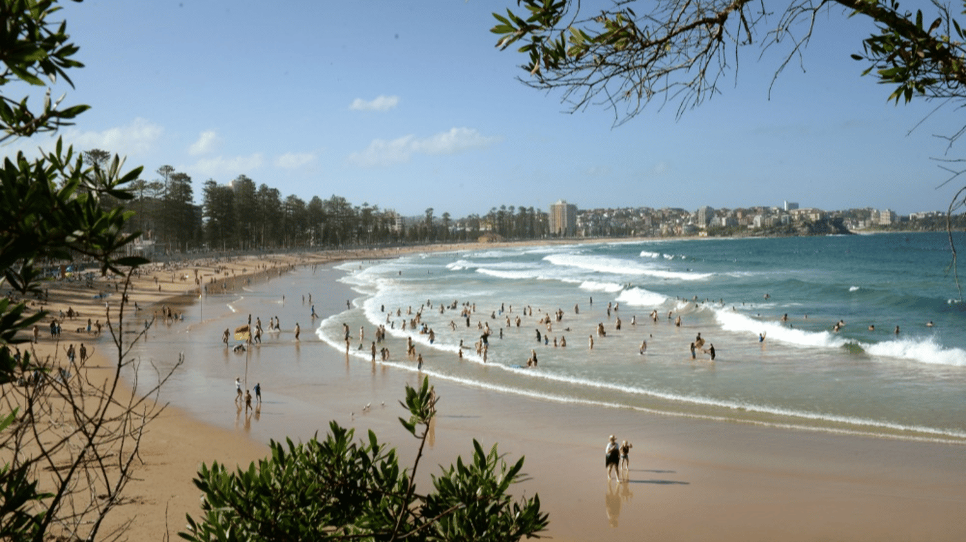 Enjoy free time at Manly Beach and stroll along The Corso