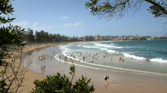 Enjoy free time at Manly Beach and stroll along The Corso