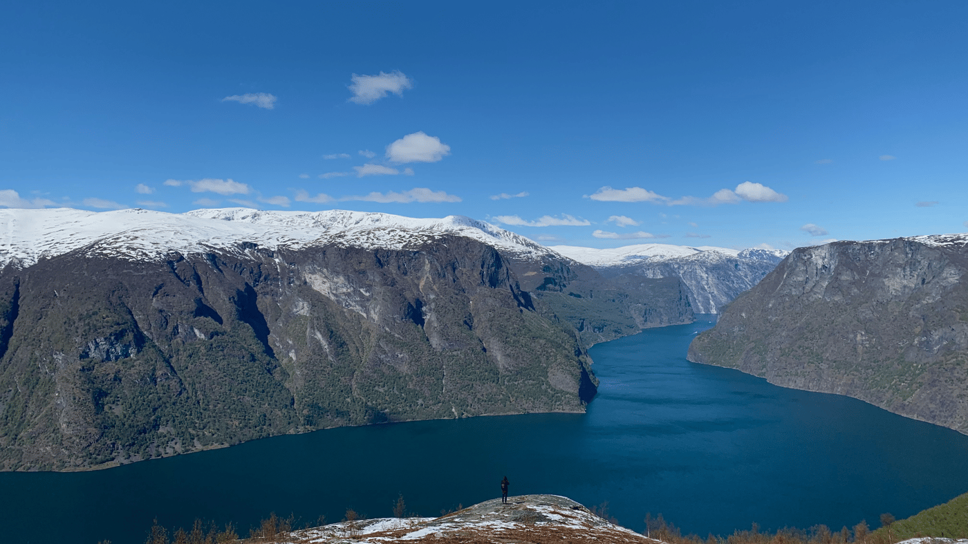Surrounded by towering mountains the tiny village of Flåm, with some 500 inhabitants, nestles at the head of Aurlandsfjord, the innermost arm of the mighty Sognefjord