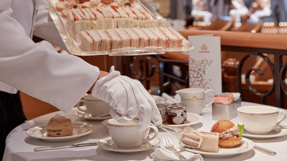 Afternoon Tea, served by white-gloved waiters from 3.30 to 4.30pm every day in the Queens Room. Indulgent finger sandwiches, scones and pastries accompany Twinings fine leaf teas, as the orchestra provides a melodic backdrop.