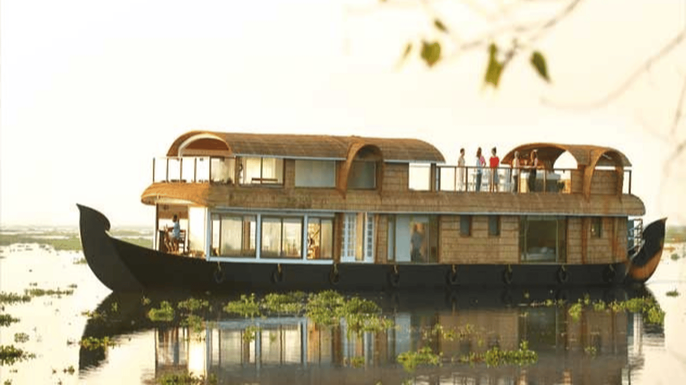 Witness village life as you cruise on a converted rice barge known as a 'Kettuvallam'