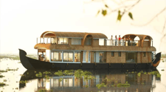 Witness village life as you cruise on a converted rice barge known as a 'Kettuvallam'