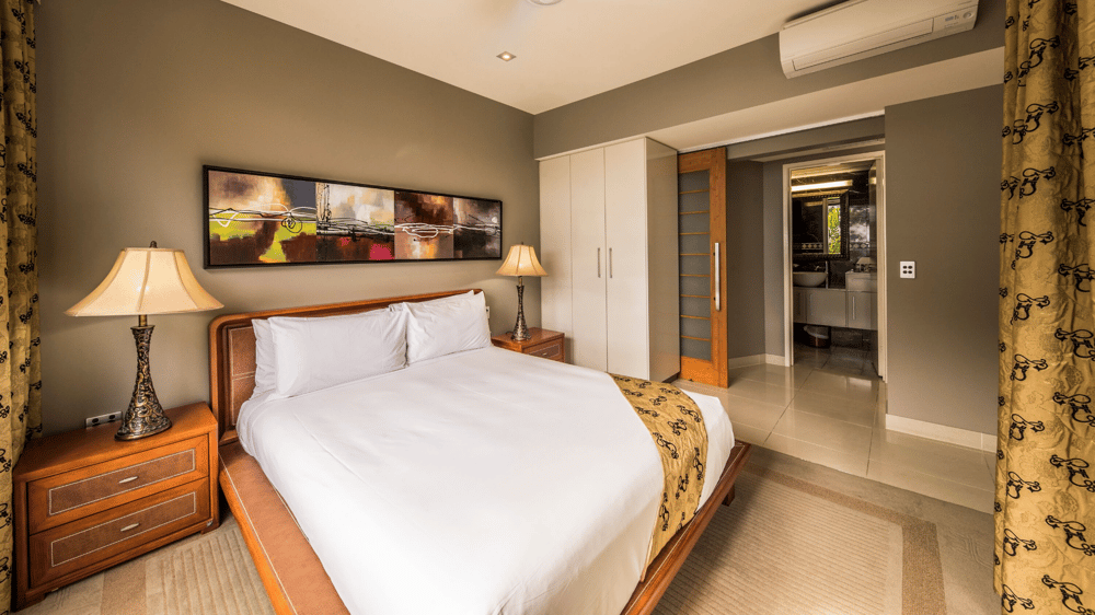 The bedroom in an Island Suite