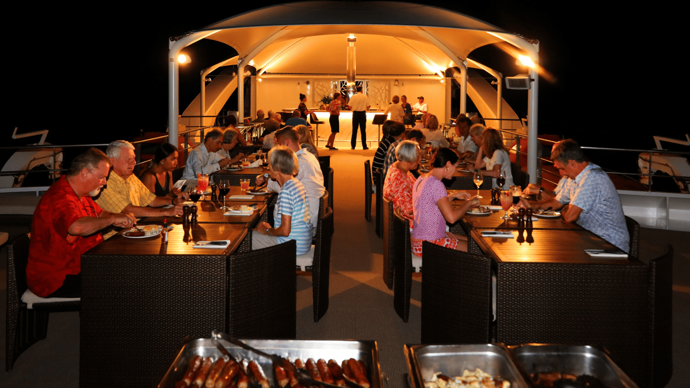 Enjoy a BBQ dinner on the sun deck