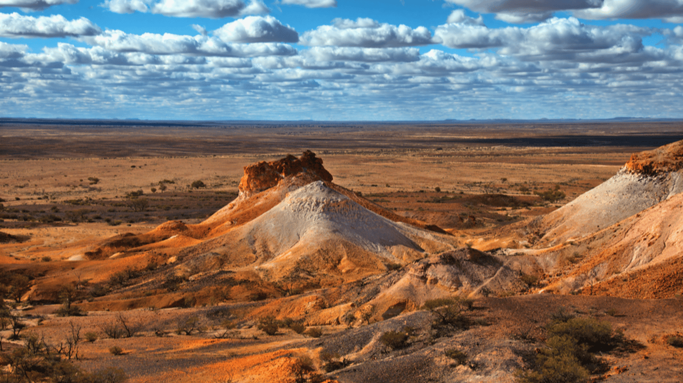 Travel through salt-lake country to isolated Coober Pedy, regarded by many as the opal capital of the world