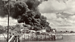 The harrowing view from Stokes Hill, Darwin in February 1942
