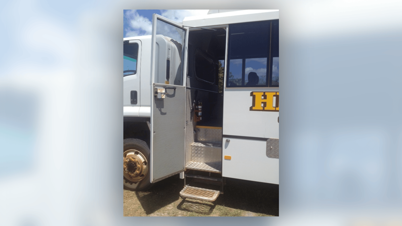 Steps to enter the purpose built Isuzu off road 4WD tour-vehicle