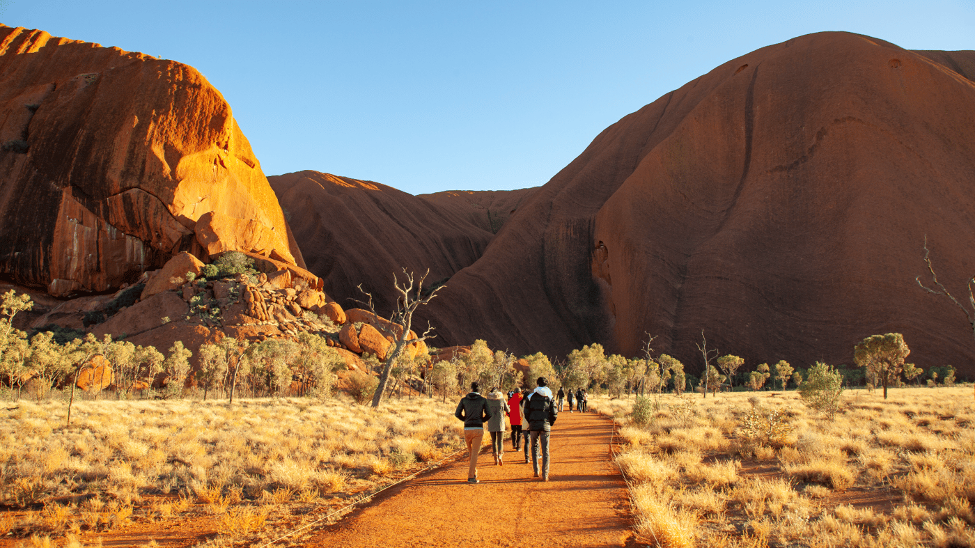 Tour Group walking near Uluru 