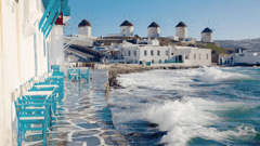 Wander through the narrow, winding streets of Mykonos with its whitewashed houses, flowers and brightly painted shutters and doors.