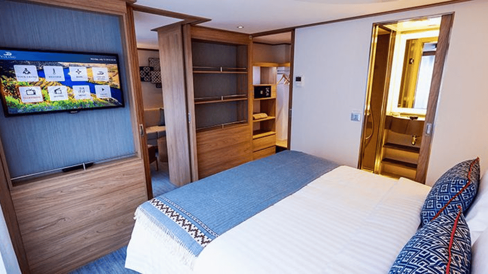 VERANDA SUITE - River-view stateroom with floor-to-ceiling sliding glass door opening to full-size veranda