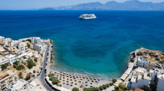 Agios Nikolaos, Crete, Greece: This charming village of white houses climbing up the slopes is beautifully situated on the sparkling Gulf of Mirabello. The attractive Venetian harbor is surrounded by restaurants, outdoor cafes and clusters of shops selling everything from necessities to souvenirs. The ship docks in the center of town, and you are able to wander at will and enjoy the atmosphere of Crete's foremost resort. 