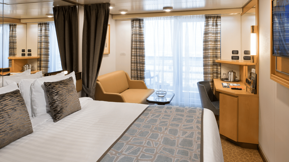 Verandah Stateroom - Filled with light from floor-to-ceiling windows overlooking a private verandah