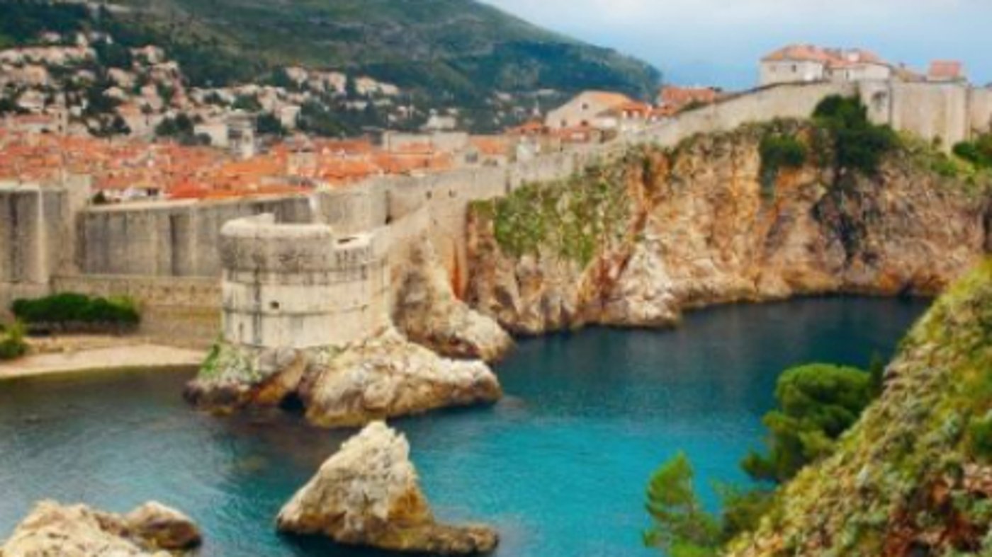 Dubrovnik  known for its distinctive Old Town, encircled with massive stone walls completed in the 16th century. 