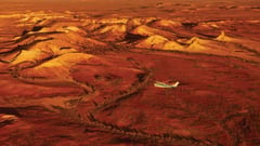 Fly over the fragile lunar landscape of Painted Hills