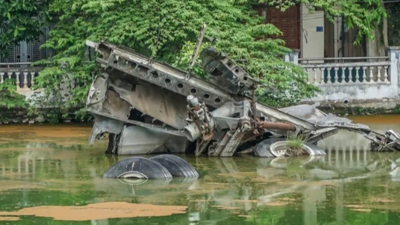 Closeup photo of a wreckage of an american B-52 bomber shot during the Vietnam War crashed in Huu-Tiep-lake