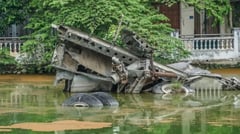 Closeup photo of a wreckage of an american B-52 bomber shot during the Vietnam War crashed in Huu-Tiep-lake