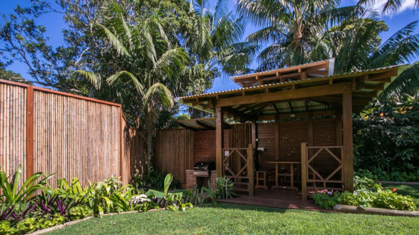 Kick back with a book and a glass of wine in the garden.